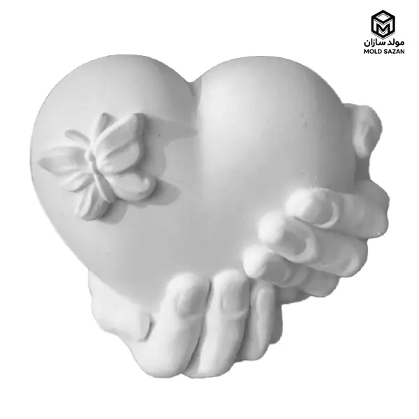 Butterfly heart candle mold in hand قالب شمع قلب پروانه ای در دست